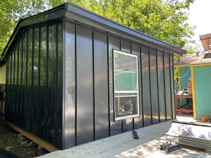 Black standing seam metal wall panels for Roof Inspection in Thief River Falls