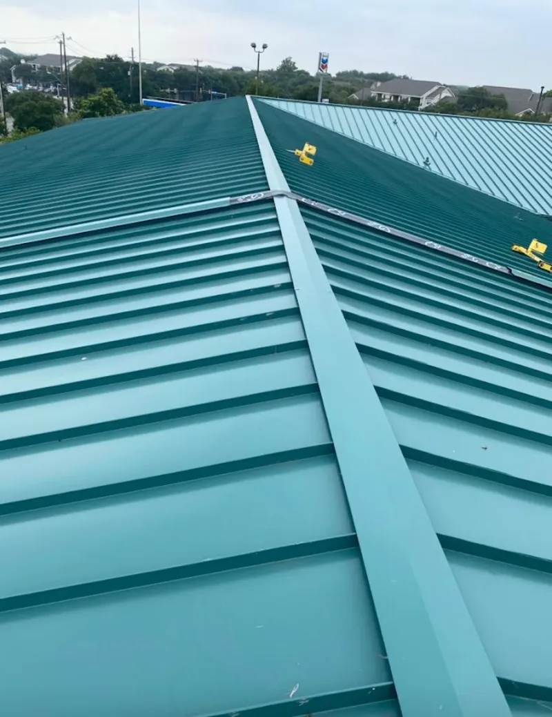 Green commercial metal roof ridge and valley for Metal Roof Repair in Thief River Falls